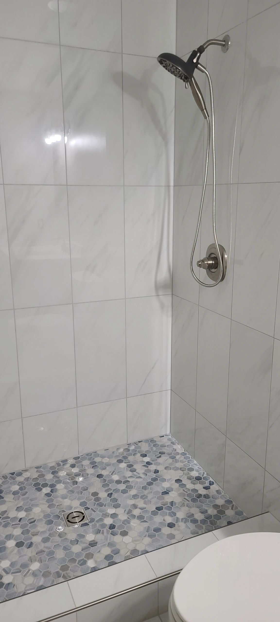 Shower tile and plumbing installation by Essential Plumbing in Jackson, GA